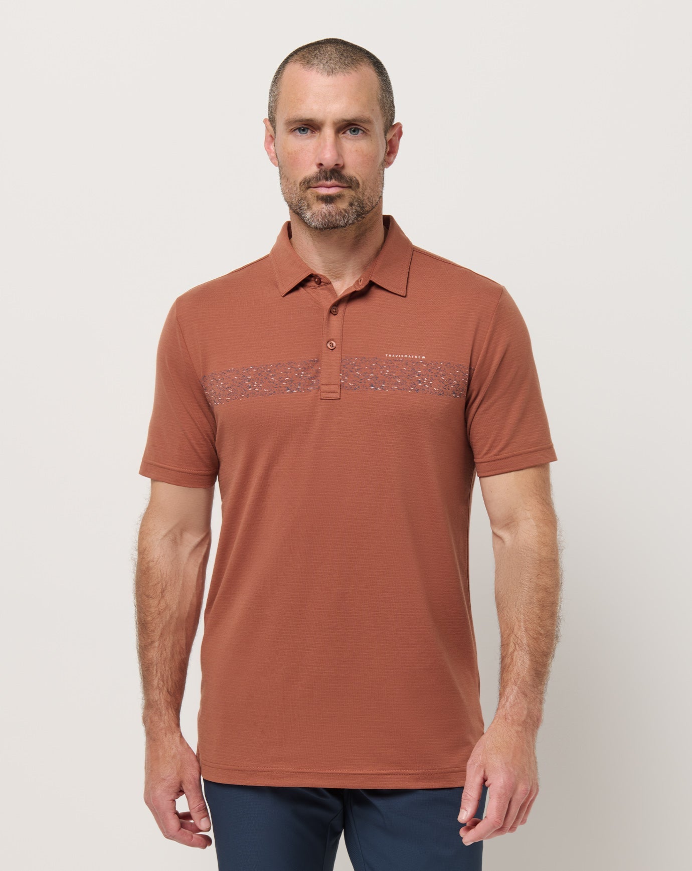 Travis Mathew The Heater Chest Stripe Polo