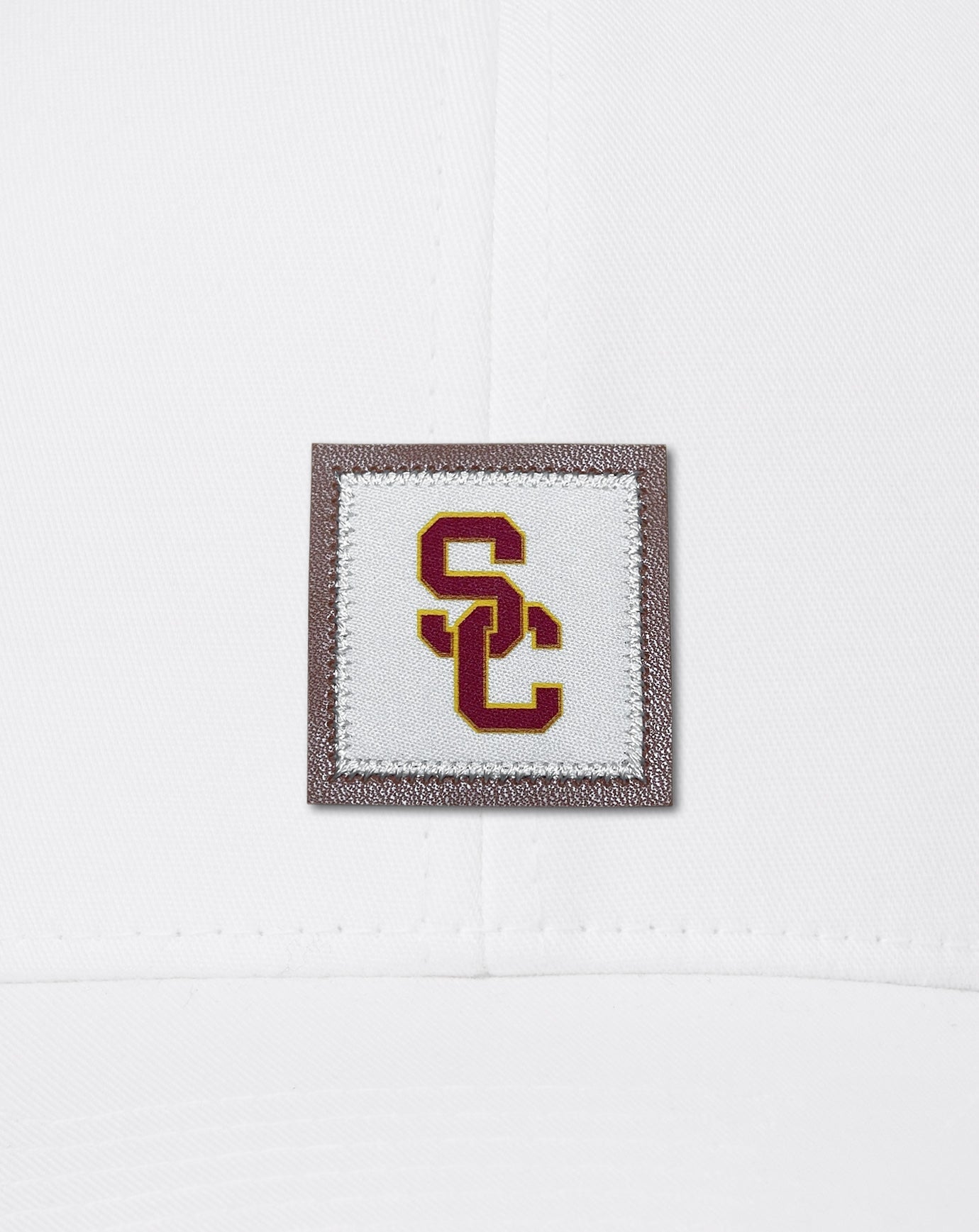 Travis Mathew USC Leather Patch Snapback Hat